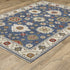 8' X 11' Blue And Ivory Floral Area Rug With Fringe