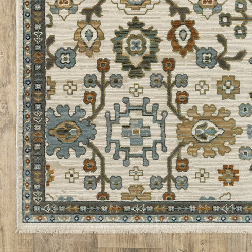 8' X 11' Ivory Blue And Brown Floral Area Rug With Fringe