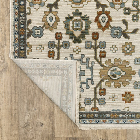 8' X 11' Ivory Blue And Brown Floral Area Rug With Fringe