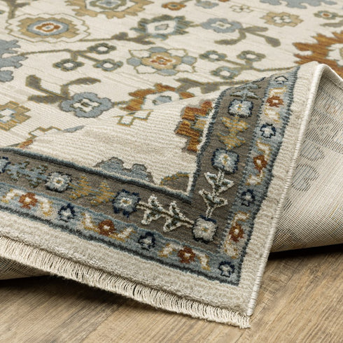 8' X 11' Ivory Blue And Brown Floral Area Rug With Fringe