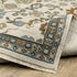 8' X 11' Ivory Blue And Brown Floral Area Rug With Fringe