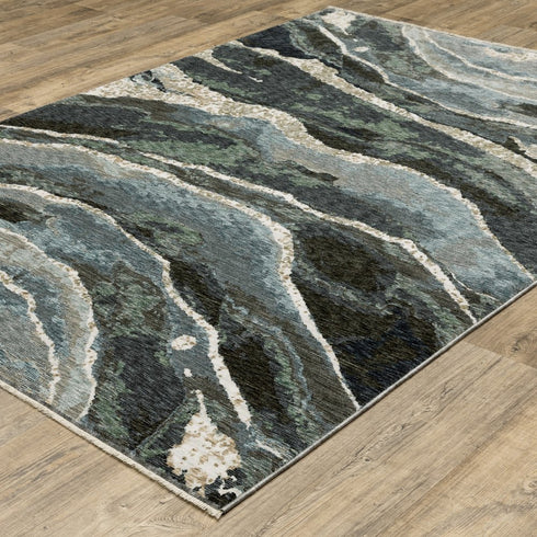 8' X 11' Blue Black And Beige Abstract Area Rug With Fringe