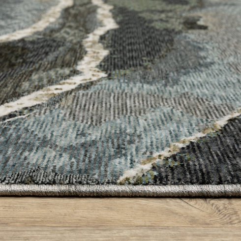 8' X 11' Blue Black And Beige Abstract Area Rug With Fringe