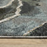 8' X 11' Blue Black And Beige Abstract Area Rug With Fringe