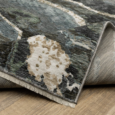 8' X 11' Blue Black And Beige Abstract Area Rug With Fringe