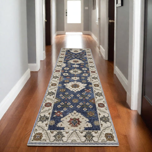 8' X 11' Blue And Ivory Floral Area Rug With Fringe
