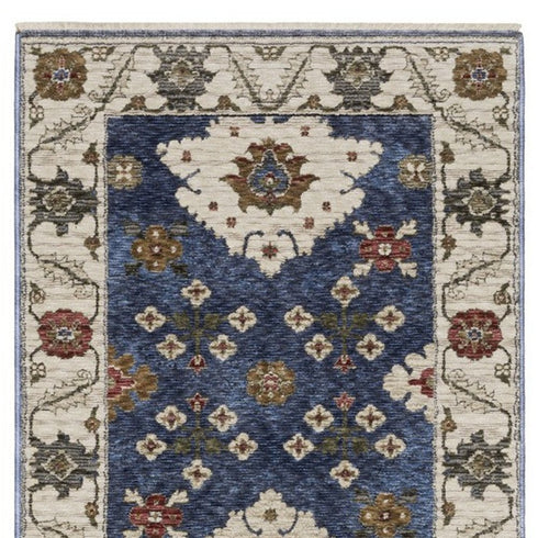 8' X 11' Blue And Ivory Floral Area Rug With Fringe