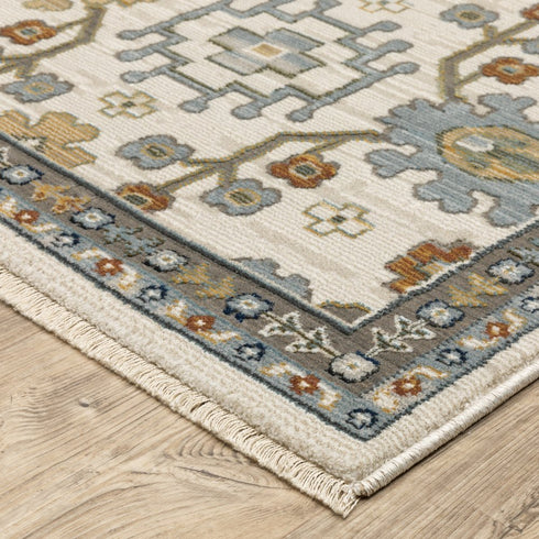 8' X 11' Ivory Blue And Brown Floral Area Rug With Fringe