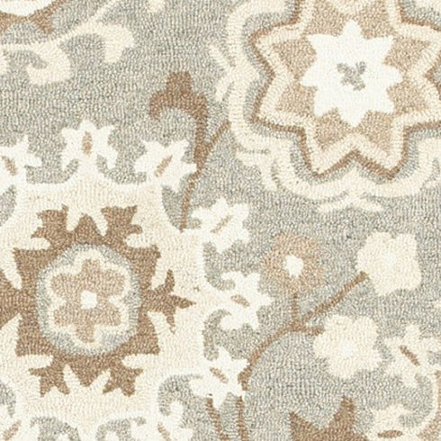 8' X 10' Gray And Sand Wool Floral Hand Tufted Area Rug