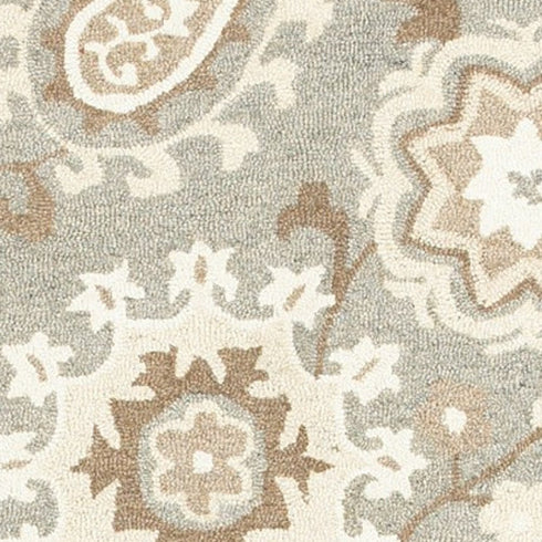 8' X 10' Gray And Sand Wool Floral Hand Tufted Area Rug