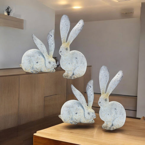 Set of Four Gray Polyresin Figurine Tabletop Sculpture