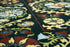 8' X 11' Beige Red And Orange Tribal Washable Area Rug With UV Protection