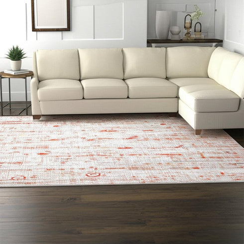 9' X 13' Gray White And Orange Tribal Washable Area Rug With UV Protection