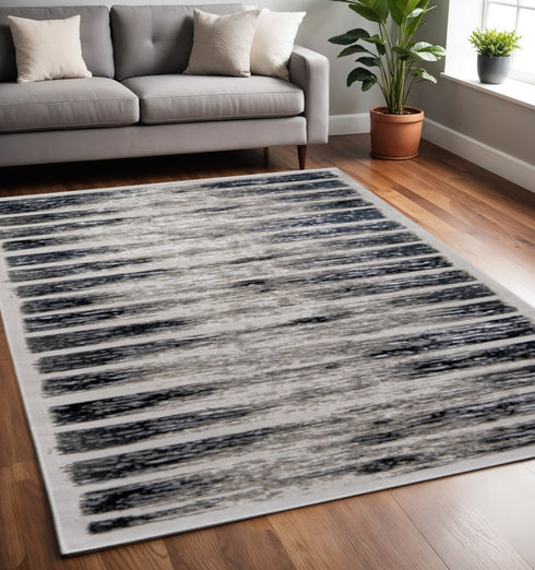 8' X 10' Gray And Black Abstract Distressed Area Rug