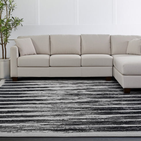 8' X 10' Gray And Black Abstract Distressed Area Rug