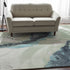 8' X 10' Green Blue And Ivory Abstract Hand Tufted Area Rug