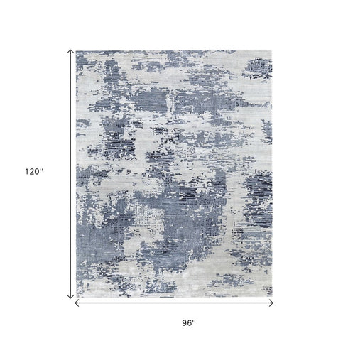 9' X 12' Blue And Ivory Abstract Hand Tufted Area Rug