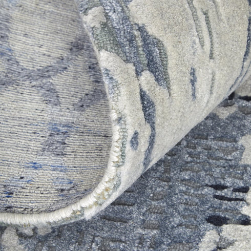 9' X 12' Blue And Ivory Abstract Hand Tufted Area Rug