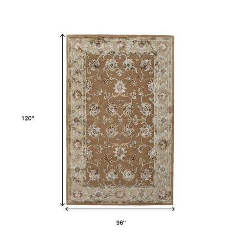 8' X 10' Tan And Ivory Floral Hand Tufted Area Rug