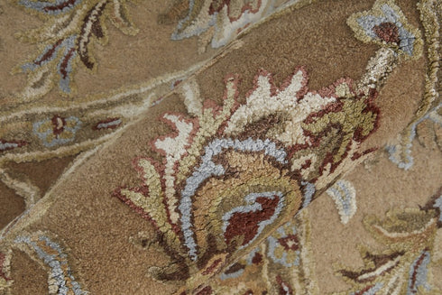 8' X 10' Tan And Ivory Floral Hand Tufted Area Rug