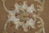 8' X 10' Tan And Ivory Floral Hand Tufted Area Rug