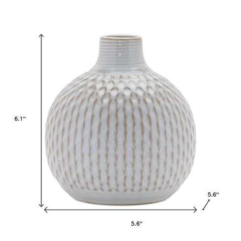 Set of Four Natural And Off White Ceramic Bud Vases With Sculptural Details