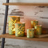 Set of Two Green Floral Glass Tabletop Pillar Candle Holders
