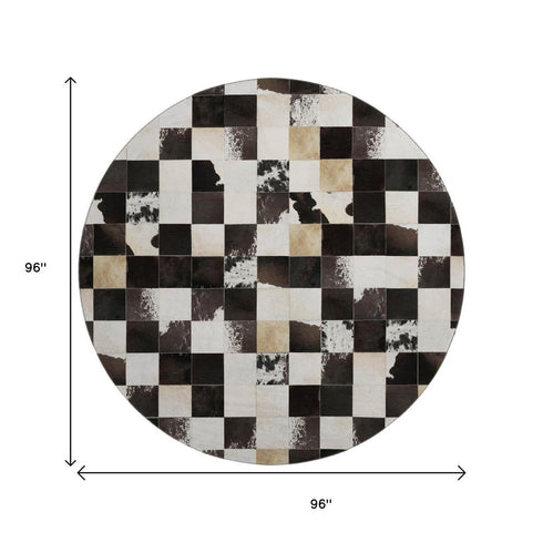 9' X 12' Black Ivory And Beige Patchwork Washable Area Rug With UV Protection