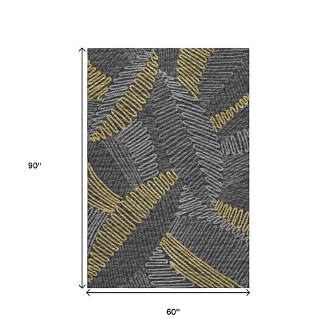 9' X 12' Gray Gold And Black Botanical Leaves Washable Area Rug With UV Protection