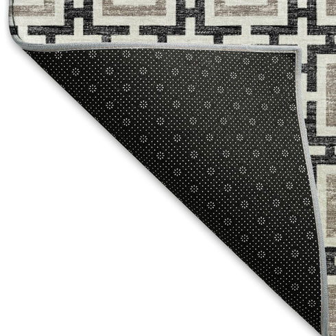 5' X 8' Black And Ivory Geometric Washable Area Rug With UV Protection