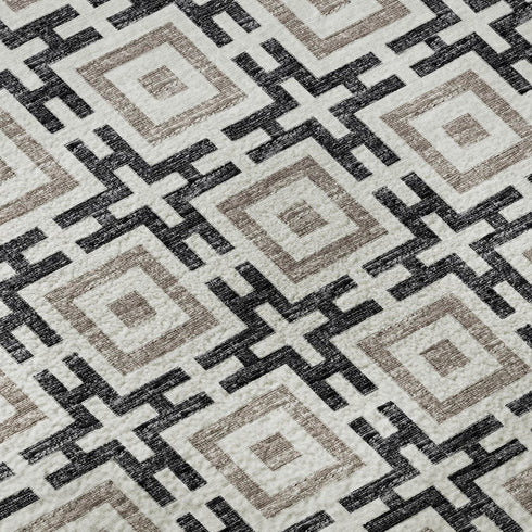 5' X 8' Black And Ivory Geometric Washable Area Rug With UV Protection