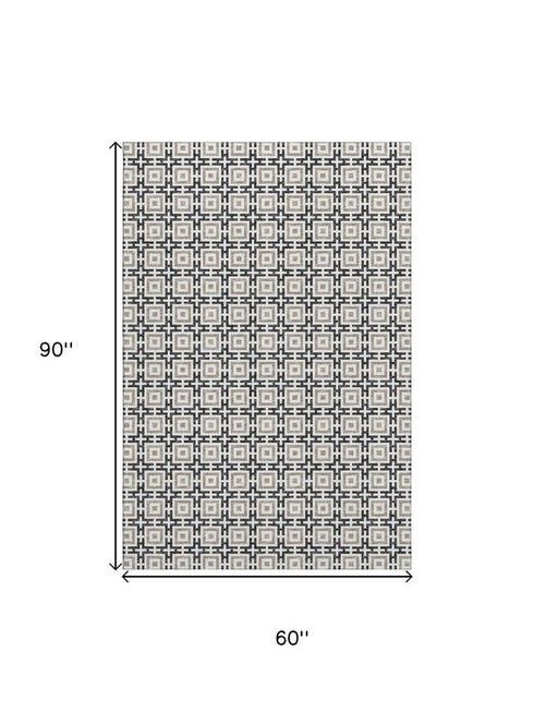 5' X 8' Black And Ivory Geometric Washable Area Rug With UV Protection