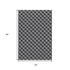 5' X 8' Black And Ivory Geometric Washable Area Rug With UV Protection