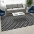 5' X 8' Black And Ivory Geometric Washable Area Rug With UV Protection