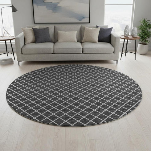 8' Black And Ivory Geometric Washable Round Rug With UV Protection