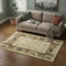 5' X 8' Brown Beige And Rust Animal Print Washable Area Rug With UV Protection