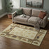 5' X 8' Brown Beige And Rust Animal Print Washable Area Rug With UV Protection