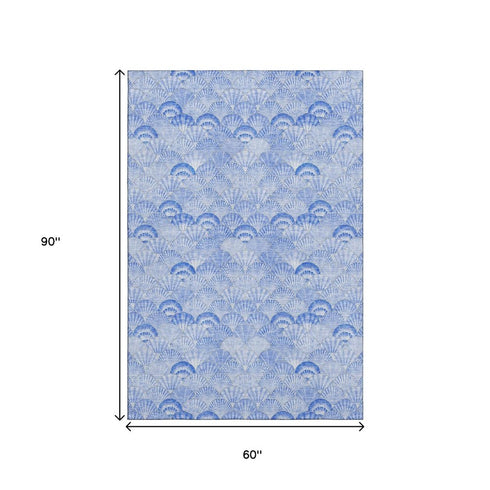 5' X 8' Blue And Ivory Geometric Washable Area Rug With UV Protection