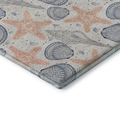 8' Peach Ivory And Navy Blue Geometric Washable Round Rug With UV Protection