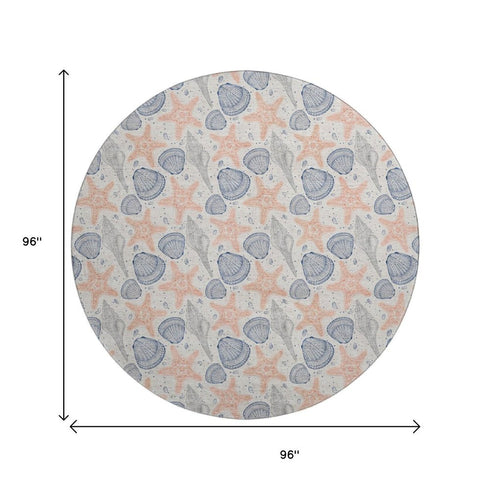 8' Peach Ivory And Navy Blue Geometric Washable Round Rug With UV Protection