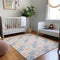 8' X 10' Peach Ivory And Navy Blue Geometric Washable Area Rug With UV Protection