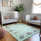 9' X 12' Green Light Blue And Beige Geometric Washable Area Rug With UV Protection