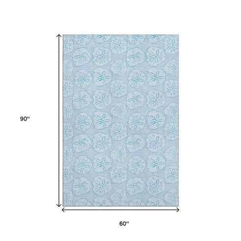 5' X 8' Blue And Ivory Geometric Washable Area Rug With UV Protection