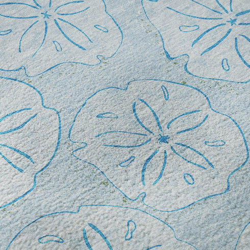 5' X 8' Blue And Ivory Geometric Washable Area Rug With UV Protection
