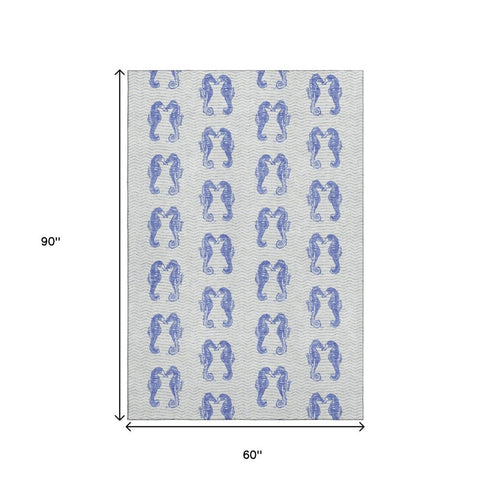 5' X 8' Blue And Ivory Geometric Washable Area Rug With UV Protection