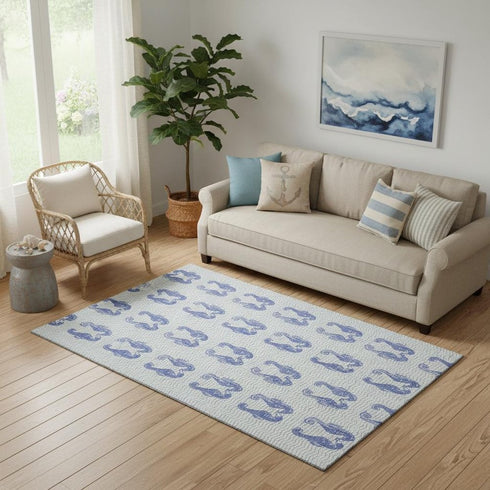 5' X 8' Blue And Ivory Geometric Washable Area Rug With UV Protection