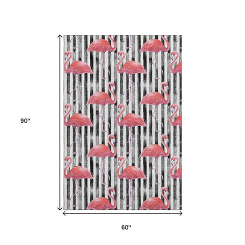 9' X 12' Pink Black And White Geometric Washable Area Rug With UV Protection