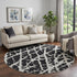 9' X 12' Black And Ivory Abstract Washable Area Rug With UV Protection