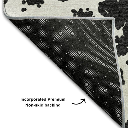 9' X 12' Black And Ivory Abstract Washable Area Rug With UV Protection