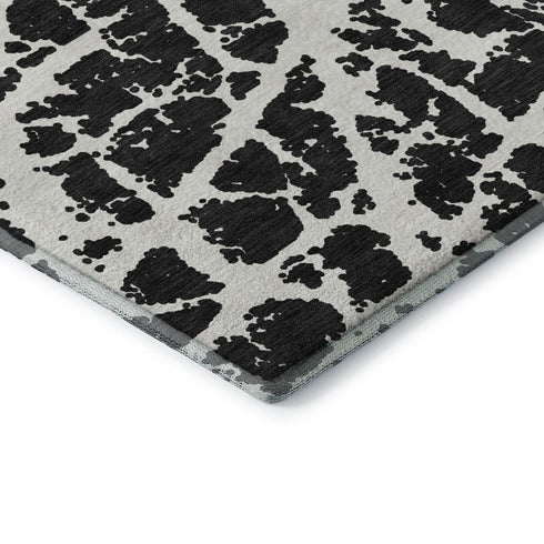 9' X 12' Black And Ivory Abstract Washable Area Rug With UV Protection